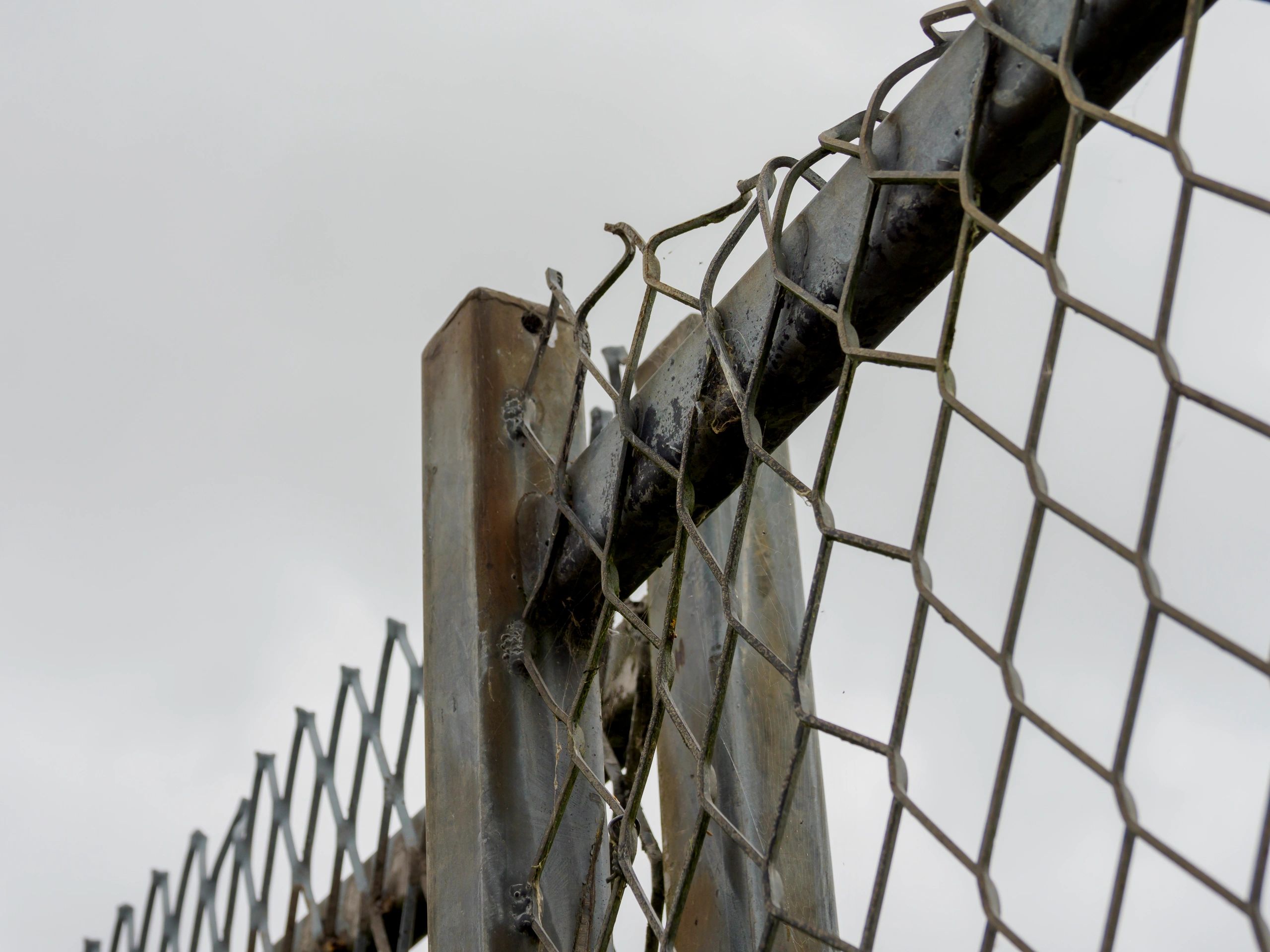 Damaged chain link fence