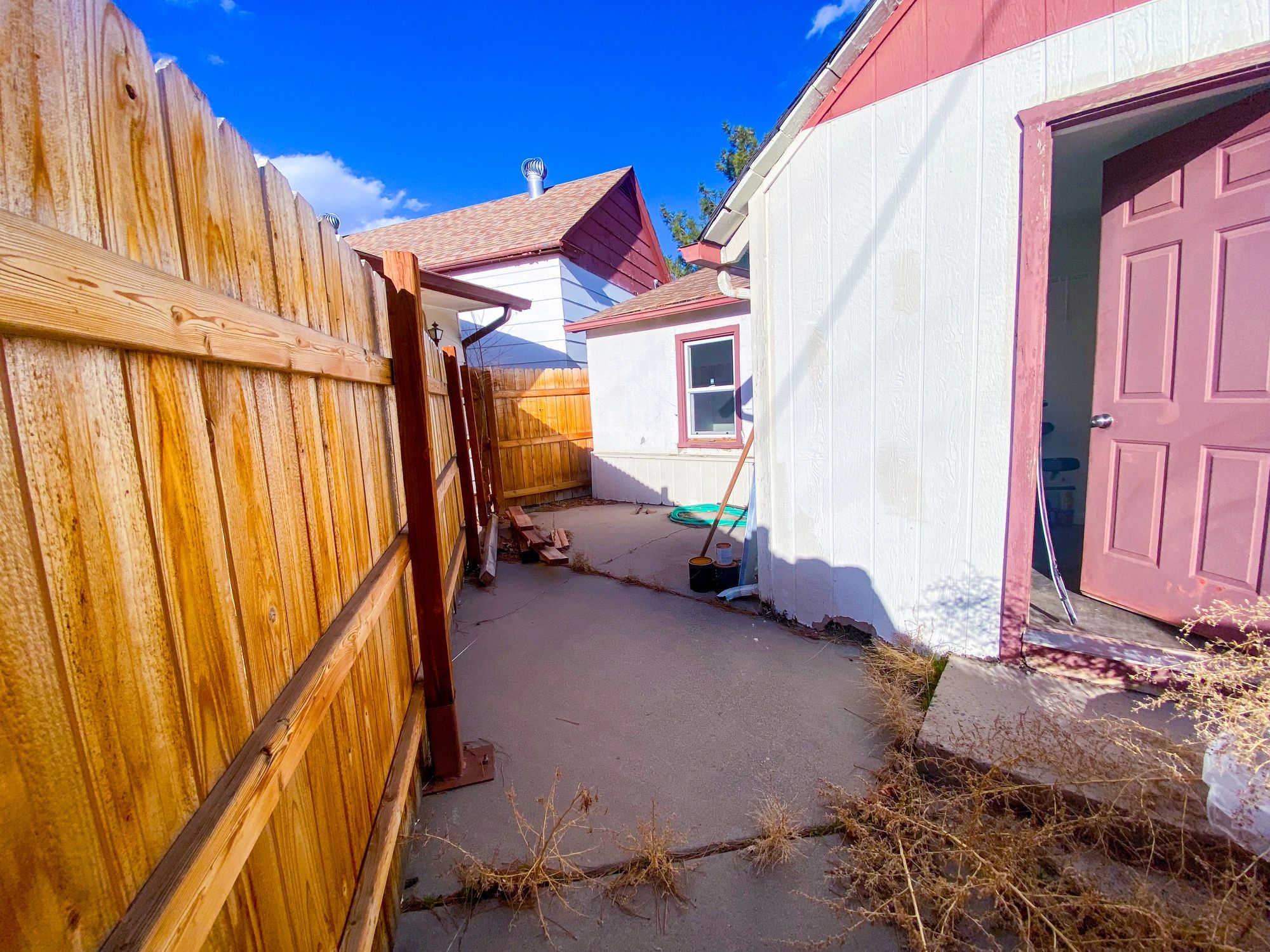 Affordable Housing Backyard Walkway and Utility Shed